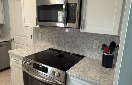 Treasure Island Condo | Dolphin & Manatee At Your Back Door!