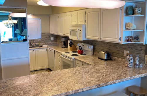 Thomas Drive Condo | Dolphin View Escapade