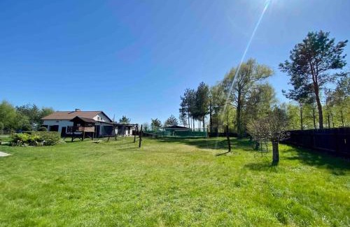 Przechlewo House | Domek w ogrodzie przy lesie i jeziorze GiNTEROWO