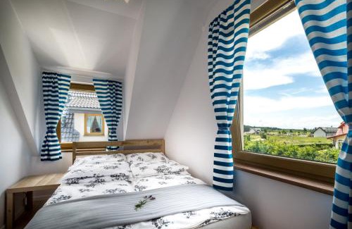 Nowecin House | Domki Łeba, Apartamenty Łeba - Polanki23 - basen, sauna, kino