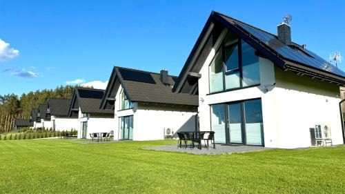 Lipnica House | Domki nad jeziorem u Izy z balią ogrodową