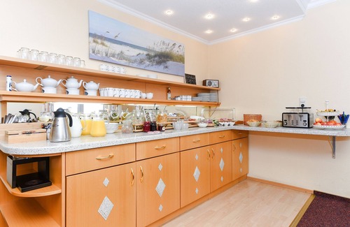 Esens Cottage | Doppelzimmer Juist - Pension Nordkap in Bensersiel