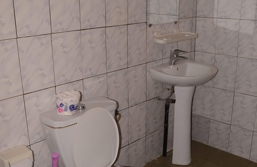 Kribi Hotel | Double room-Basic-Ensuite with Shower-Courtyard view