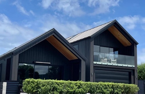 Pauanui House | Double Waterfront Pauanui Waterways Home With Stunning Views And Private Jetty