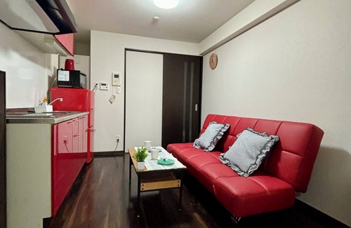 Tanimachi Apartment | DOUTONBORI Sleeps up to 5 w 2 beds 1 sofa bed Convenient land