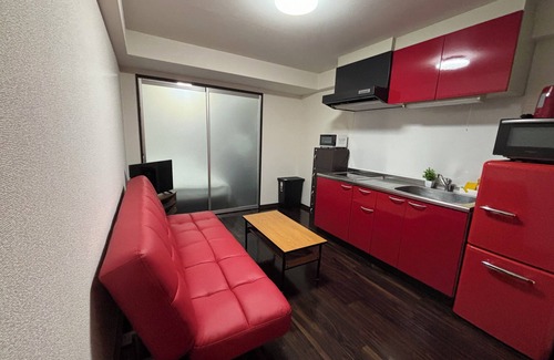 Tanimachi Apartment | DOUTONBORI Sleeps up to 5 w 2 beds 1 sofa bed Convenient land