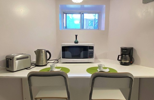 The Beaches House | downtown 1 bedroom basement apartment with exclusive backyard