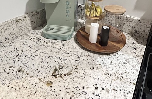 F. Q. Story House | Downtown flat with free parking on premises!