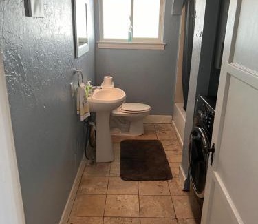 F. Q. Story House | Downtown Neighborhood Room 1