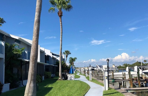 Madeira Beach Condo | DREAM GETAWAY 2 BD 2BATH 1st floor Waterfront Condo complex! Pools,Patios etc