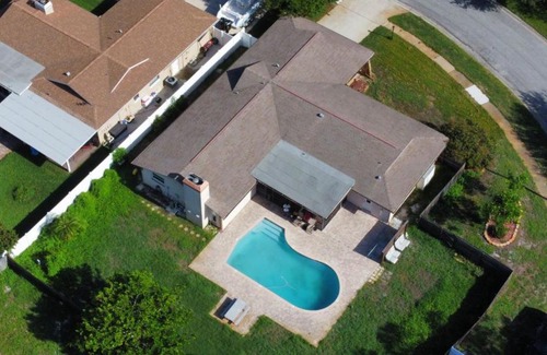 Seminole House | Dream Vacation Home w Heated Pool Close to Beaches Clearwater St Pete Quiet with Big Backyard
