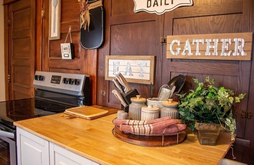 Cedar Rapids House | Dreamy cottage in prime Newbo location - Wheelchair and Pet Friendly - steps from bars, cafes and re