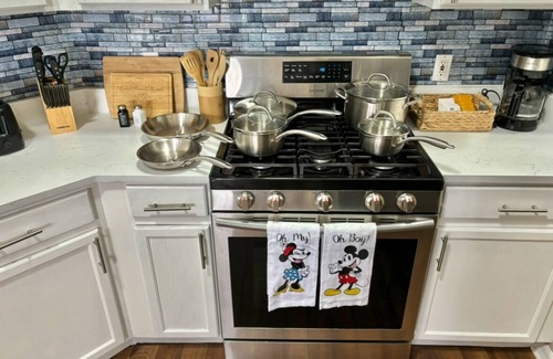 Crescent Lakes House | Dreamy Lakeview Villa with Heated Pool BBQ Family Friendly Near Disney