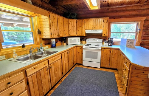 Drummond House | Drummond Island Hotel & Vacation Homes - Fairview Cove Log Home