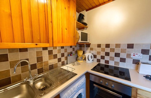 Crianlarich Ski Chalet | Eagle Lodge with stunning loch and mountain view