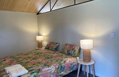 Topaz Other | Early Diggings Hut surrounded by Rainforest and verdant pasture.