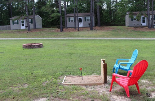 Gasburg Cabin | Ec Lake Gaston Cabin in natural woodland setting on beautiful Lake Gaston