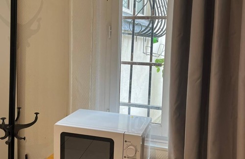 Quartier de la Porte-Saint-Denis Apartment | Echiquier - Cosy Studio