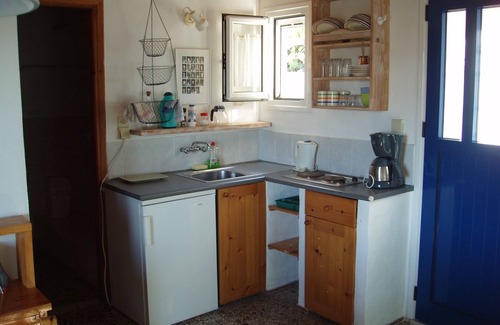 Petrochori House | Eco friendly cottage in large rambling garden. 400m walk to the sea.