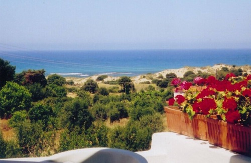 Petrochori House | Eco friendly cottage in large rambling garden. 400m walk to the sea.