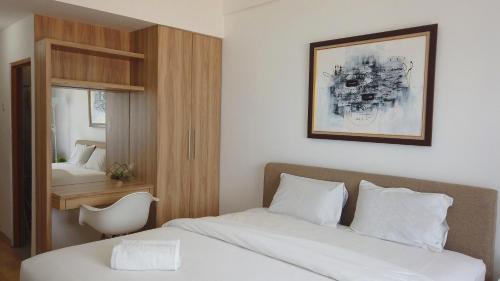 Cileunyi Apartment | Economic Luxurious Studio Pinewood Apartment Jatinangor near JATOS By Travelio