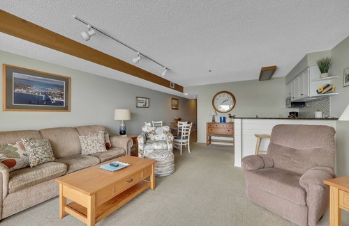 Charlevoix Condo | Edgewater Inn 115 | Sunrise Over Lake Charlevoix | Pool, Hot Tub, Sauna