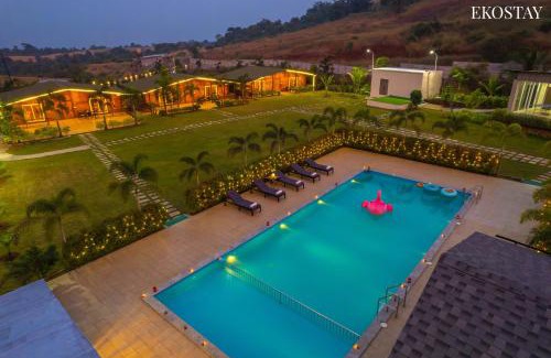Karjat Villa | EKOSTAY Luxe - Woodstock Villa I 2 Acre Property I Cricket Turf I Party Friendly