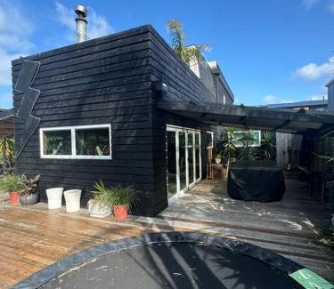 Bowentown House | Electric Waihi Beach House - family & dog friendly, close to beach, pool table, outdoor fire room, skate ramp