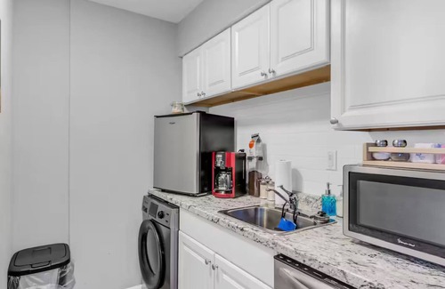 Lawrence Apartment | Elegant 3BR Retreat: Comfort, Style Prime Location