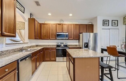 Watersong House | Elegant 6 Bed 4 1/2 Bath Pool Home, Privacy & Resort Amenities and Relaxation