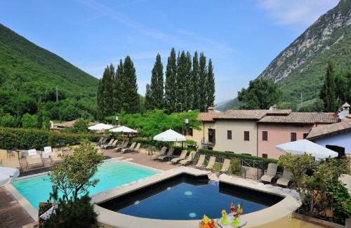 Foligno House | Elegant apartment in resort with swimming pool featuring nature and tranquillity