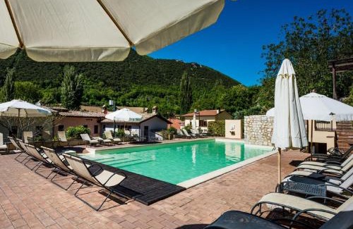 Foligno House | Elegant apartment in resort with swimming pool featuring nature and tranquillity