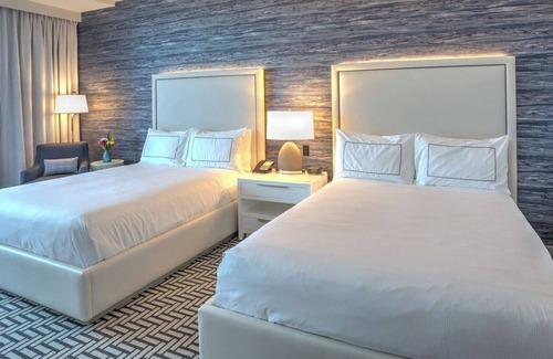 Central Beach House | Elegant Balcony Room Overlooking Beach Near Pier Fishing and Art Walks