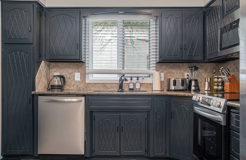 West Omaha House | Elegant Golden Getaway, w/Hot Tub & Fenced Yard!