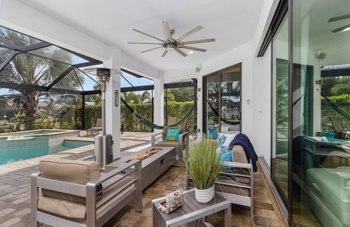 Yacht Club House | Elegant Gulf-access home w/electric-heated pool and spa - Villa Barbara