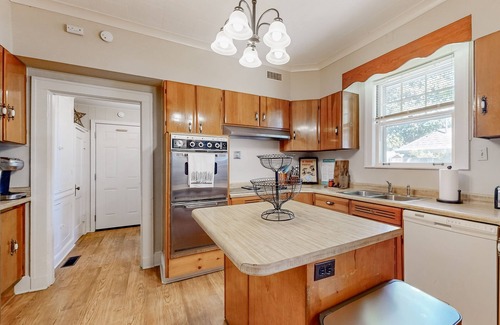 Evergreen House | Elegant home with abundant outdoor living areas, library & dog-friendly yard