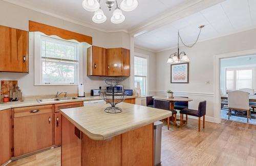 Evergreen House | Elegant home with abundant outdoor living areas, library & dog-friendly yard
