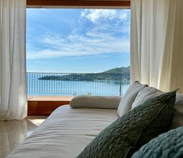 Portovenere Apartment | Elegant modern and bright flat with splendid terrace overlooking the sea and Palmaria Island Modern designer interior accommodates up to six people