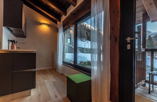 La Thuile Apartment | Elegant mountain vacation home located within walking distance of ski facilities