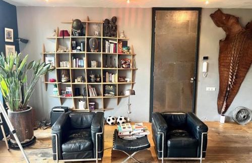 De Weteringschans Apartment | Elegant penthouse LOFT of 250 m2 in city centre with huge roofgarden 80 m2