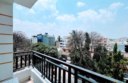 Jayanagar Hotel | Elegant Queen Room with Private Balcony & AC