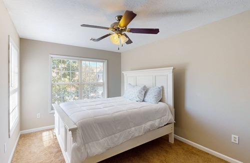Gracewood House | Elegant townhome with fenced yard, community pool, & W/D - near golf