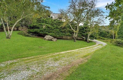 Hay Beach House | Elegant Treetop Modern Steps from Hay Beach, Heated Gunite Pool