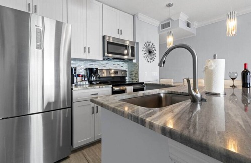 Rocky Point Apartment | Elegant Waterfront Condo with Pool and Private Balcony