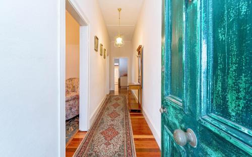 Grafton Apartment | Eliza 1875 Red Brick Duplex Townhouse
