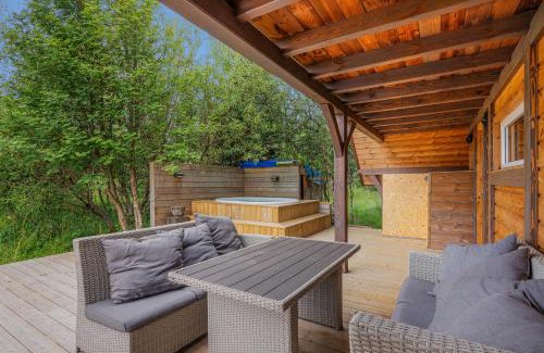 Blaskogabyggd House | Embrace Nature by the River - Hot Tub and Scenic Views