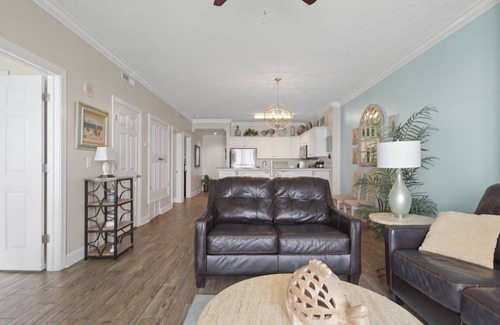 West Panama City Beach Condo | Emerald Isle 1401 - Front row beach chair service included! Affordable rates!