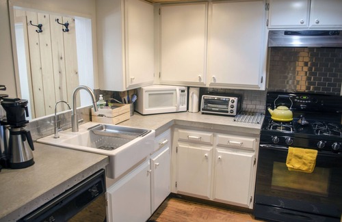 Kings Beach House | Enchanted Cabin - Walk to Lake, Hot tub & Pet Friendly!