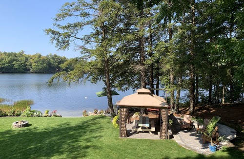 Gray House | Enchanting, secluded home with private sandy beach on Forest Lake in Gray, Maine