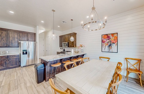 Ivins House | Enchanting townhome with pool, hot tub, fire pit, games, & great balcony views